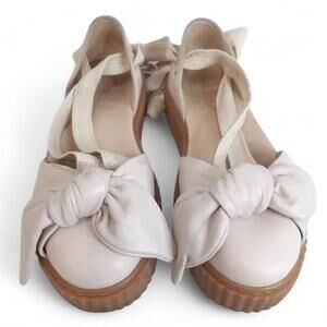 This is a Fenty x Puma Bow Creeper Sandal